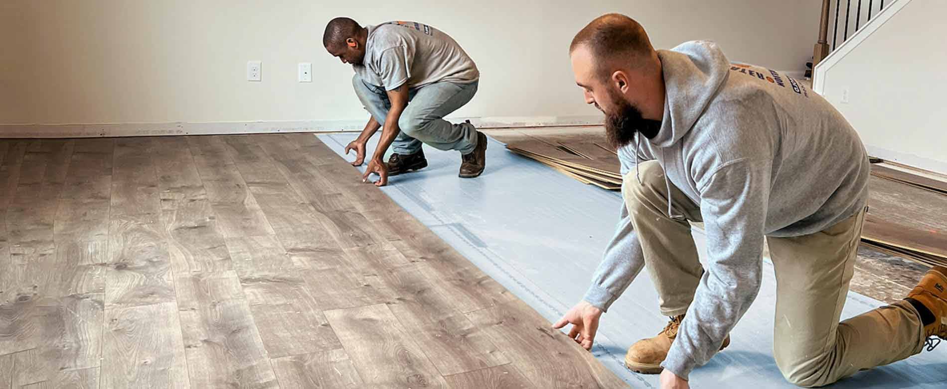 Technicians performing emergency water damage restoration