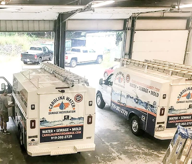 Carolina Water Damage Restoration service trucks and crew